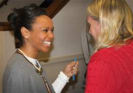 “The Amazing Race” winner Maya Warren talks with Rosati-Kain H.S. math teacher Patricia Osmundson during a visit to her alma mater Jan. 6 in St. Louis. (Photo by Joe Kenny) 