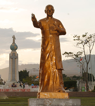 The right hand of a nearly 10-foot tall statue of Archbishop Oscar Romero is seen cut off March 6 near Plaza El Divino Salvador del Mundo in San Salvador, El Salvador. Archbishop Romero recently was declared a martyr. (Photo by Catholic News Service.)