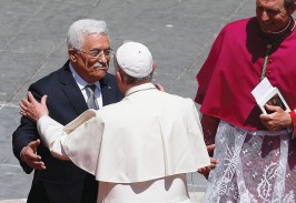 Palestinian President Mahmoud Abbas greets Pope Francis at the conclusion of the canonization Mass for four new saints in St. Peter’s Square at the Vatican May 17.  (Photo  Catholic News Service/Paul Haring)