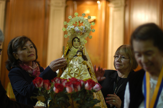 The ivory image depicts the Virgin Mary holding the Child Jesus in her left arm and a Rosary in her right hand. (Photo by Maria-Pia Negro Chin)