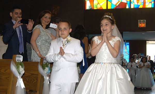 First Communion Is Right Setting for May Crowning