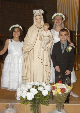 First Communion Is Right Setting for May Crowning