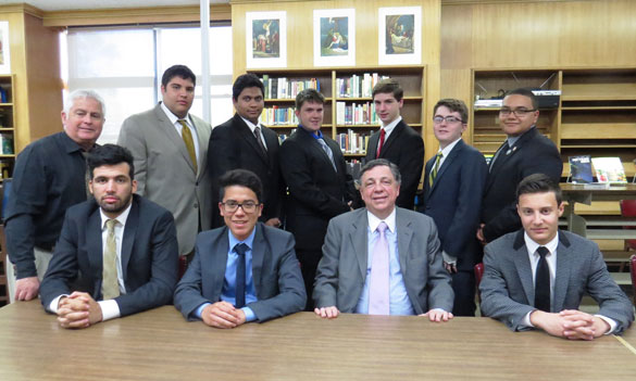 Mock Trial Team members from Holy Cross H.S., Flushing, meet with Supreme Court Judge John Barone ’66, who came to share his personal life experiences. Pictured bottom row from left: Talles Moreira ’15, Joshua Santis ’17, Judge Barone and Joseph Lombardi ’16. Standing, from left: Tom Pugh, moderator; Nicholas Medina ’16, Fareed Asgar ’15, Joseph Leuthner ’15, Daniel Bosko ’17, Brian Lavelle ’15, and Nabil Tavarez ’16.