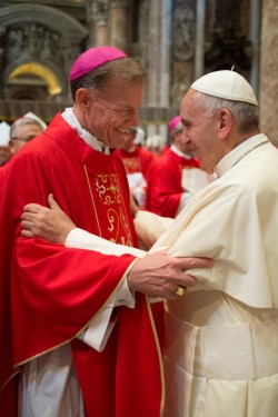 Pope Francis greets Archbishop John C. Wester of Santa Fe, N.M., after a Mass marking the feast of Sts. Peter and Paul in St. Peter's Basilica at the Vatican June 29. (CNS photo/Paul Haring) 