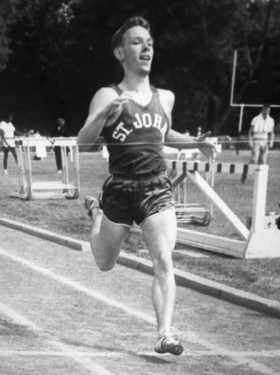 Former St. John’s University Olympic runner, Tom Farrell, is shown during his collegiate career. (Photo courtesy St. John’s Athletic Communications)