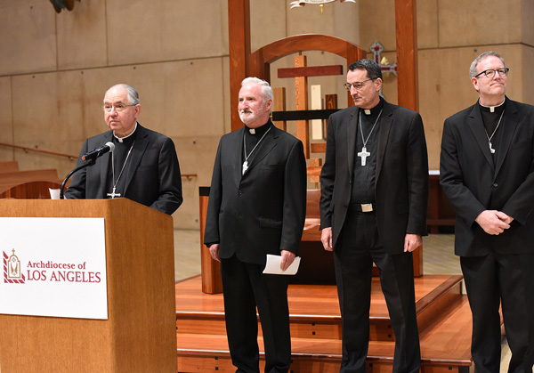 Los Angeles Archbishop Jose H. Gomez introduces Msgr. David G. O'Connell, Msgr. Joseph V. Brennan and Father Robert Barron July 21 at the Cathedral of Our Lady of the Angels in Los Angeles. The three priests will serve as auxiliary bishops of the largest archdiocese in the United States in terms of Catholic population. (CNS photo/Tamara Tirado)