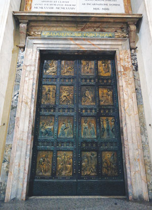 The Holy Door is pictured in St. Peter’s Basilica at the Vatican. Vatican officials are adopting a reservation system for pilgrims who want to cross the threshold of the Holy Door during the Year of Mercy. (Photo by Catholic News Service/Paul Haring) 