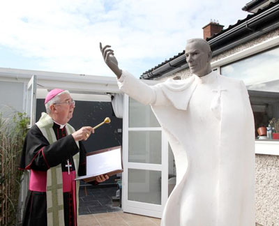Archbishop Diarmuid Martin of Dublin blesses an unfinished statue of Archbishop Fulton J. Sheen in Dublin. (Photo by John Mc Elroy)