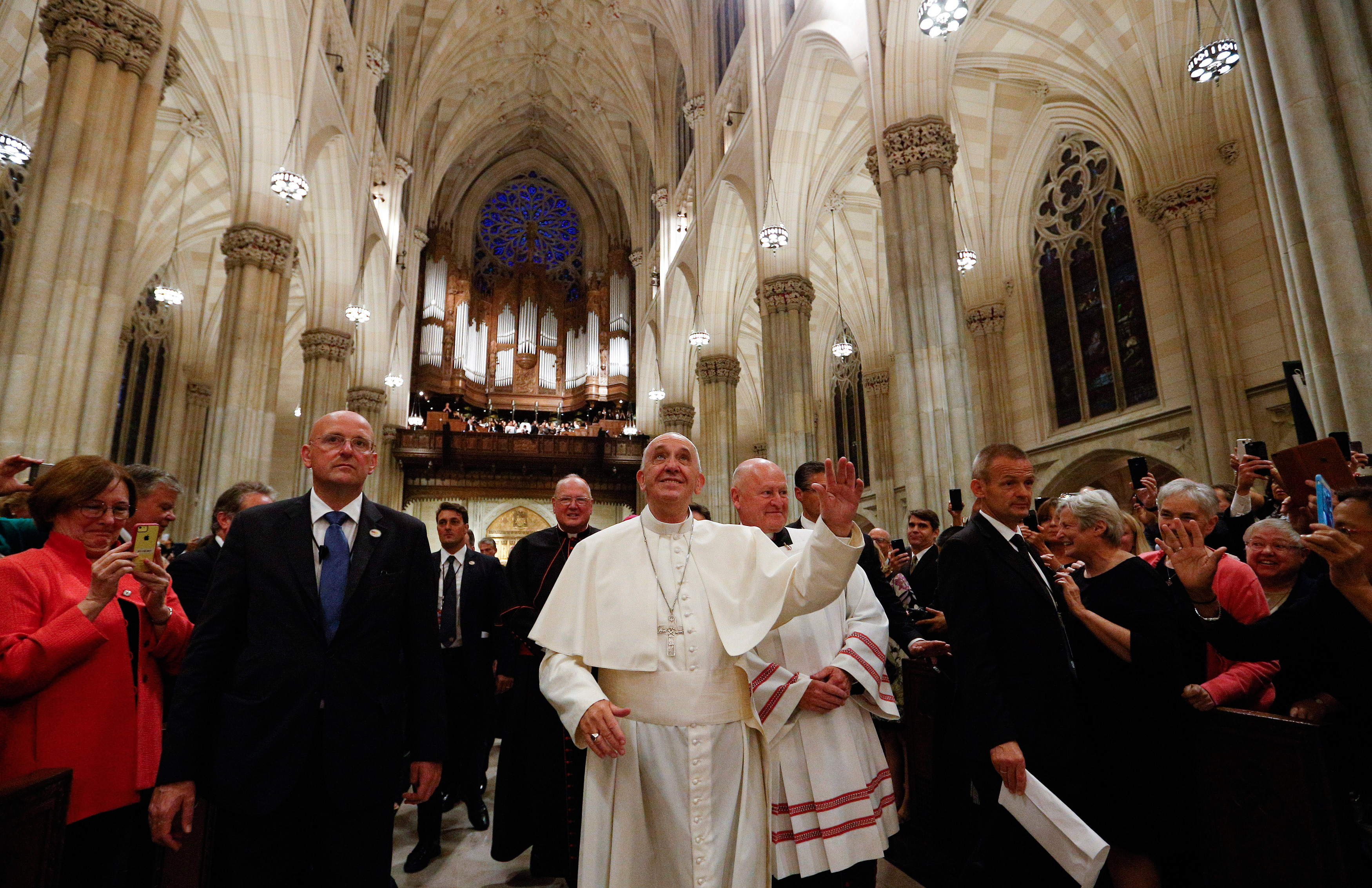 Pope Francis enters St. Patrick’s Cathedral, Manhattan, escorted by the rector, Msgr. Robert T. Ritchie, and Cardinal Timothy Dolan before the start of a prayer service led by the Holy Father Sept. 24. Photo © Catholic News Service/Paul Haring