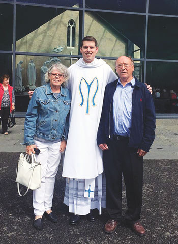 Newly ordained Father Christopher Heanue, assigned to Holy Child Jesus, Richmond Hill, is shown with his parents, Martin and Kathleen, at the Shrine of Our Lady of Knock in Ireland. (Photos courtesy of Father Christopher Heanue)