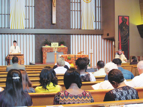 p Franciscan Father Greg Plata and congregation listen to Scripture reading during Sunday Mass at St. Francis of Assisi Catholic Church in Greenwood, Miss. The church is one of two parishes and three missions for which Father Plata is responsible. (Photo by Catholic News Service/ Patricia Zapor)