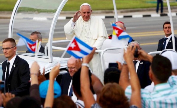 Pope Francis waves to the crowd as he arrives to celebrate Mass in Revolution Square in Havana Sept. 20. (CNS photo/Carlos Garcia Rawlins, Reuters) 