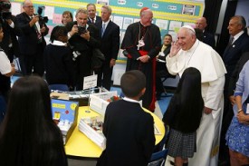 Pope Francis talks with students at Our Lady Queen of Angels School in the East Harlem area of New York Sept. 25.  (CNS photo/Tony Gentile, Reuters) 