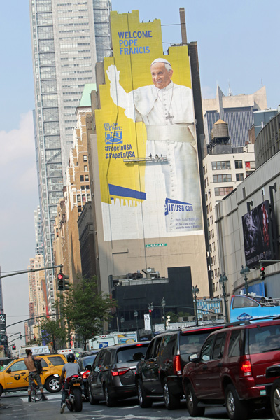 A 225-foot mural featuring an image of Pope Francis nears completion in New York City Sept. 1. The artwork was commissioned by DeSales Media Group, the communications and technology arm of the Diocese of Brooklyn, N.Y. (CNS photo/Gregory A. Shemitz)