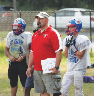  New St. Francis Prep head varsity football coach Rich Carroll is eager to carry on the legacy of the late Vince O’Connor, who coached for 62 years at the school. (Photo by Jim Mancari)