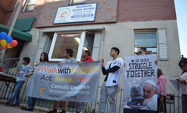 One of the stops during the walk was at CCBQ North Side Senior Center, where participants read Pope Francis words regarding the elderly. (Photos by Antonina Zielinska)