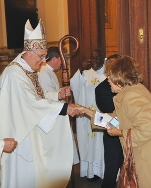 bishop-shakes-hands