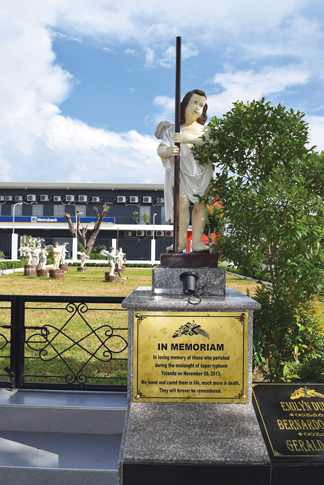 Mass grave and memorial to Typhoon Haiyan victims next to the  Metropolitan Cathedral in the Archdiocese of Palo, which Pope Francis visited in January. 