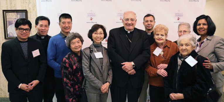 Bishop Nicholas DiMarzio poses with the Generations of Faith team from St. Michael’s parish, Flushing.