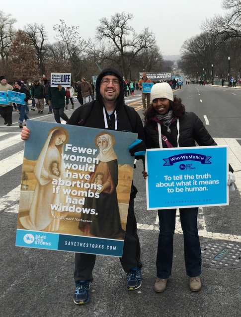 Michael Germano, campus ministry director at Archbishop Molloy H.S., Briarwood, and Meera Sukhdeo from St. Benedict Joseph Labre Church, Richmond Hill, pose while marching for life in Washington, D.C., on Jan. 22. They were some of the pilgrims from Brooklyn and Queens who participated.