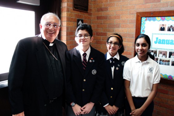 p In this 2014 file photo, Bishop Nicholas DiMarzio greets students at the former Immaculate Conception School, now Immaculate Conception Catholic Academy, Jamaica Estates, as part of his annual Catholic Schools Week schedule. 