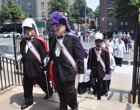 Local Knights lead the procession into Our Lady of Angels Church, Bay Ridge, for the ordinations of Auxiliary Bishops Raymond Chappetto and Paul Sanchez in this 2012 file photo. (File Photo © The Tablet)