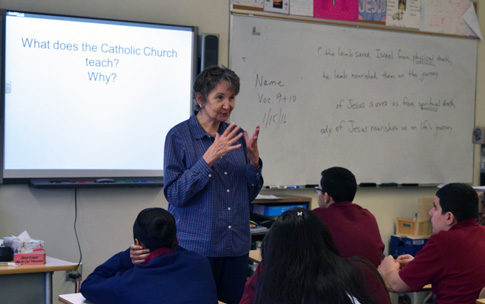 Carol Bronnenkant, religion teacher at Christ the King R.H.S., explains the Catholic Church’s position on life during a lesson. 