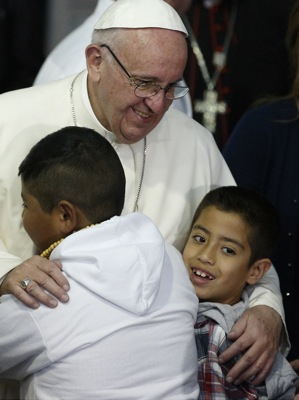 Pope Francis embraces children during a visit to the Federico Gomez Children's Hospital of Mexico in Mexico City Feb. 14. (CNS photo/Paul Haring) 