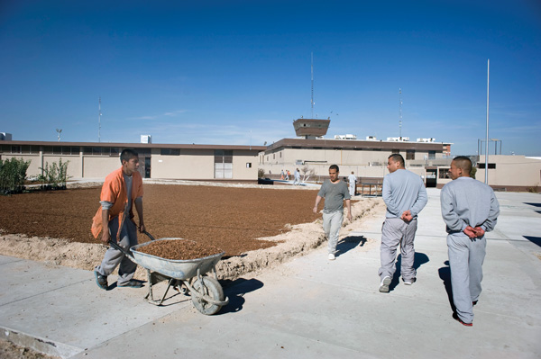 Inmates at the Chihuahua state prison in Ciudad Juarez, Mexico, work on remodeling the chapel in the men’s section of the prison Jan. 28. The chapel is being remodeled for a visit by Pope Francis, scheduled for Feb. 17. (Photo © Catholic News Service/ David Maung)