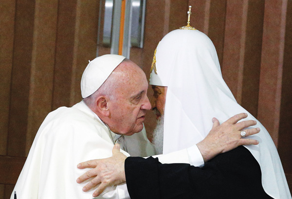 Pope Francis and Russian Orthodox Patriarch Kirill of Moscow embrace after signing a joint declaration during a meeting at Jose Marti International Airport in Havana Feb. 12. (Photo © Catholic News Service/ Paul Haring) 