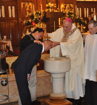 Bishop-baptizes-Chinese-man-3