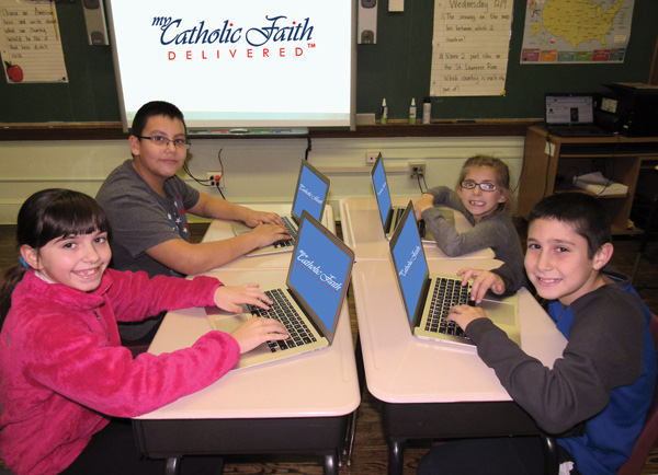 Students are taking online religious education classes this year at St. Francis de Sales, Belle Harbor, the first parish in the diocese to offer the option in partnership with My Catholic Faith Delivered. (Photo courtesy Robert Ruggiero)