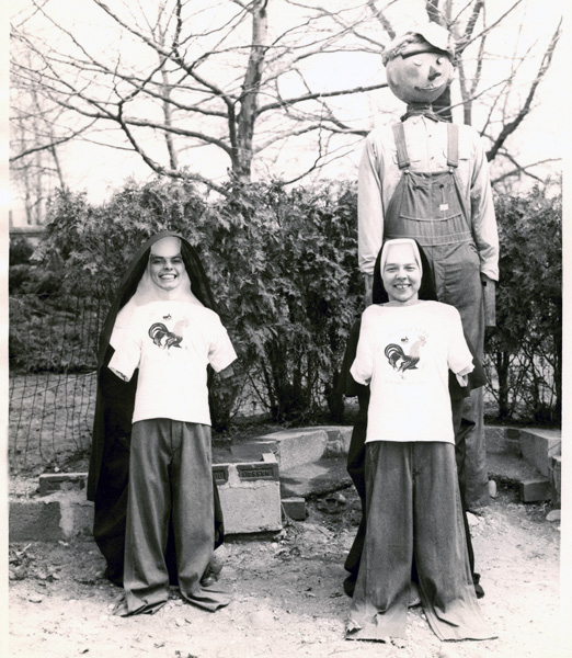Sister Camille D'Arienzo, R.S.M., left, and Sister Barbara Valuckas, S.S.N.D., left, on a farm.
