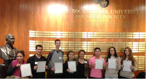 p At the end of a day of lectures at Rockefeller University, St. Francis Prep students received a certificate of completion. Pictured from left: Angelica Hernandez, George Galanis, Christopher Polloni, Kimberly Mayo, Mrs. Ashkenazy, Aaron Kim, Lanquiao Gao and Marianna Tzirani. 