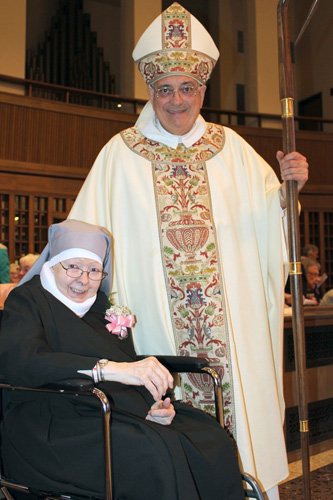 Bishop DiMarzio congratulates Little Sister of the Poor Sister Gerard Mary Bradley on her 60th anniversary.