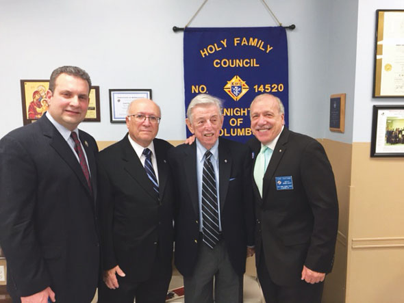 that Council recently welcomed Hall of Fame St. John’s University basketball coach Lou Carnesecca to its membership. In attendance at the induction were, from left, Grand Knight Petrino, Joe DeInnocentiis, Carnesecca and Civitano.