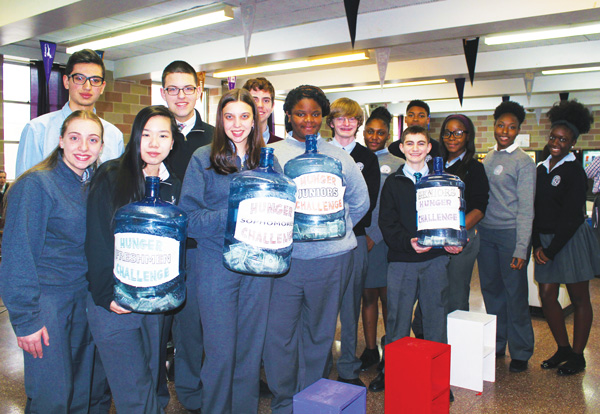 p St. Edmund Preparatory High School Students participated in the Hunger Awareness Challenge Project to help those in need by collecting money during the cafeteria periods.