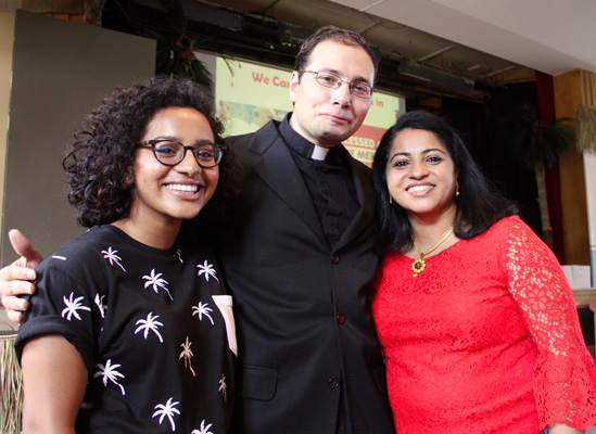 Chrisel Gladson with Father Jeremy Canna and her mom, Bindu Cheriaparampil. 