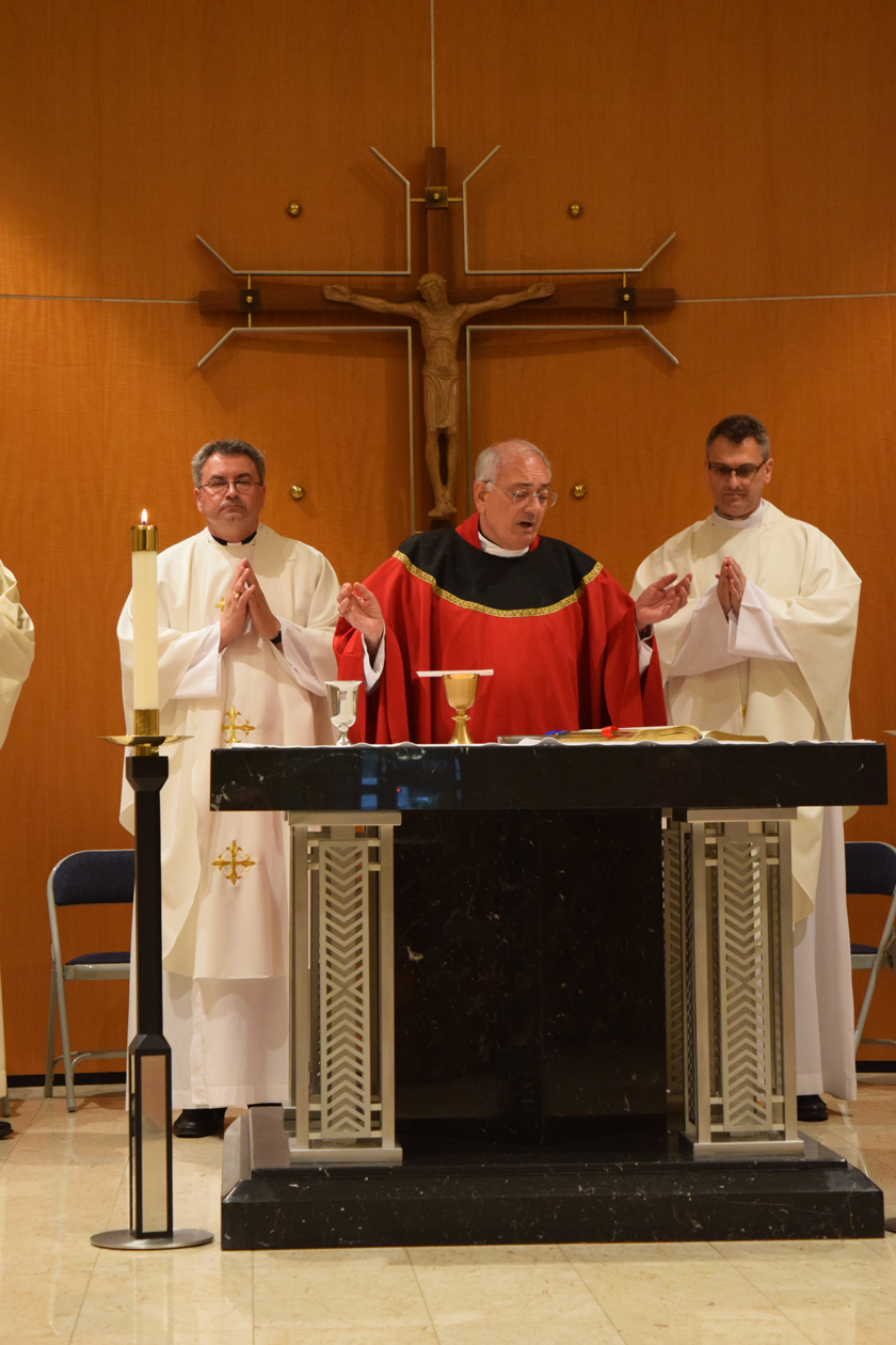 Bishop DiMarzio celebrates Mass with Auxiliary Bishop Mroziewski, left, and Father Blicharz.