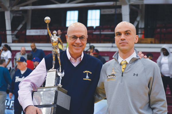 Jack Alesi, left, recently retired as head varsity basketball coach at Xaverian H.S. He is pictured with his son and assistant coach Chris Alesi.