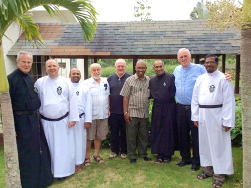 Bishop Neil, second from right, is shown with the members of the Passionist community of Jamaica, West Indies. Father James Price, C.P., is second from left.