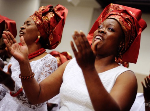 p Mary Kiganda, right, and Carolyn Ohams, both from the Archdiocese of Washington, sing during the opening Mass of the Third African National Eucharistic Congress at The Catholic University of America in Washington. The closing Mass of the congress was celebrated Aug. 7. (Photo: Catholic News Service/Leslie E. Kossof)