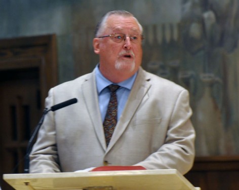 Joseph Tiedemann, the new auxiliary's brother, offers the first reading. (Photo: Ed Wilkinson)