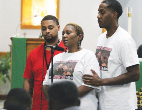  Vivian Carr and her sons, Kenneth Johnston and Ellis Carr, speak during a prayer service at Our Lady of Consolation Catholic Church in Charlotte, N.C. The previous day, Vivian’s other son, Justin Carr, died from a gunshot wound to the head that he received during protests in Charlotte which turned violent following the fatal police shooting of an African-American man. (Photo: Catholic News Service/Patricia L. Guilfoyle, Catholic Herald) 
