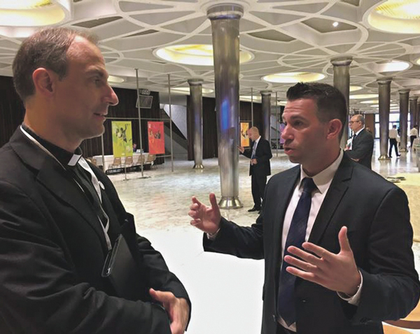 NET-TV’s director of programming Craig Tubiolo interviews Msgr. Sanchez De Toca y Alameda, the undersecretary of the Pontifical Council for Culture, at the world conference on faith and sport at the Vatican hosted by the Pontifical Council for Culture. Tubiolo is working on the NET documentary, “Ring of Faith.”