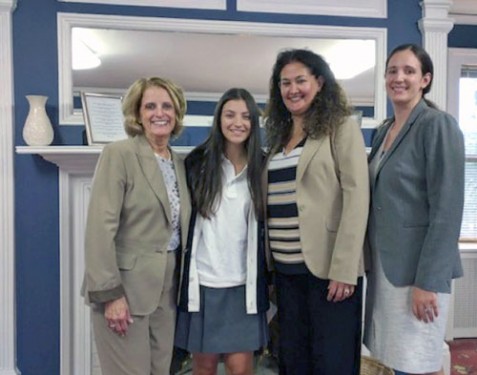 Fontbonne Hall Academy senior Isabella Grillo has earned National Merit Honors. Above, from left, Fontbonne’s Associate Principal Gilda T. King congratulates Grillo along with Principal Mary Ann Spicijaric and Assistant Principal Lauriann Wierzbowski.