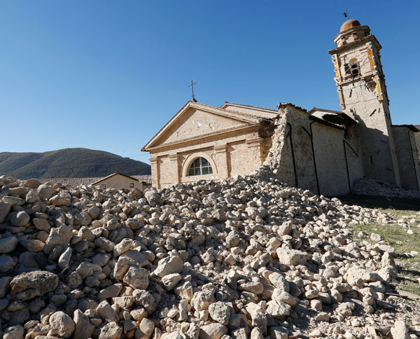 St. Anthony Church is seen partially collapsed following an earthquake along the road to Norcia, Italy. Thousands of people in central Italy have spent the night in cars, tents and temporary shelters following the fourth earthquake in the area in three months. (Photo: Catholic News Service/ Remo Casilli)