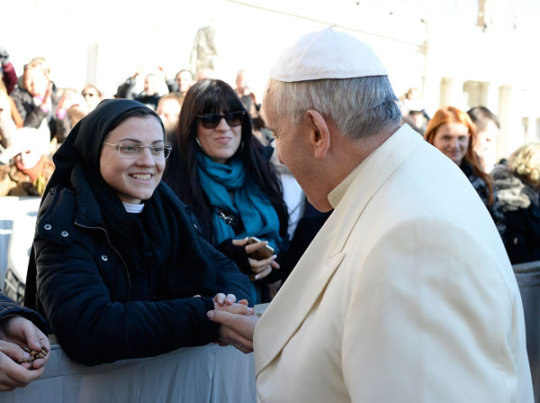 In this 2014 file photo, Pope Francis greets Sister Cristina during the weekly audience at the Vatican Dec. 10. (Photo: Catholic News Service/L'Osservatore Romano via Reuters)