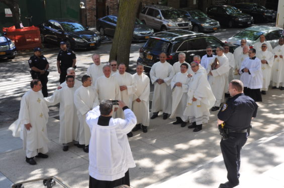 Auxiliary Bishop Octavio Cisneros poses for an informal group shot outside St. Joseph’s prior to the ordination.