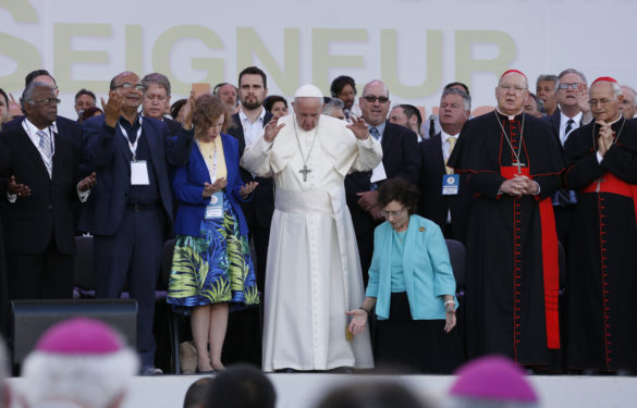 Pope Francis prays as he attends a Pentecost vigil marking the 50th anniversary of the Catholic Charismatic Renewal at the Circus Maximus in Rome June 3. (CNS photo/Paul Haring)